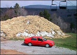 Snowshoe's stash of snow, covered by hay for protection, will be put to good use on May 27.